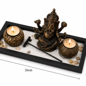 jardin estilo zen con figura Ganesha, portavelas y arena.